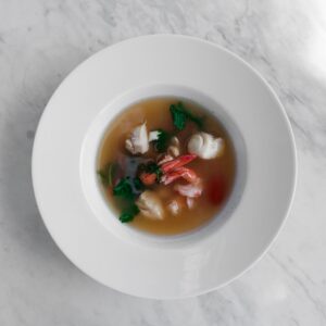 white ceramic bowl with soup